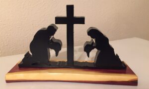 Praying Cowboy and Cowgirl at Cross w base
