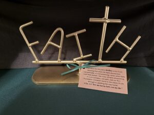 Gold (fund raiser) FAITH sign