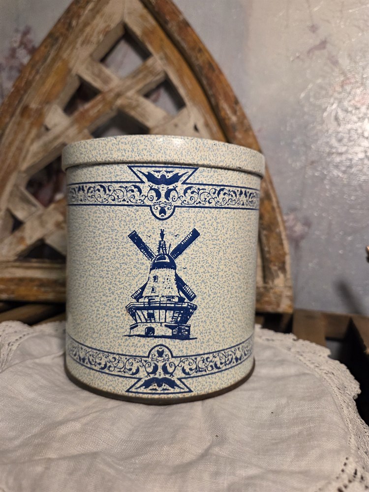 Blue and white tin with windmills